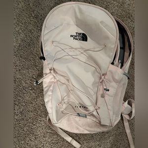 light pink northface backpack